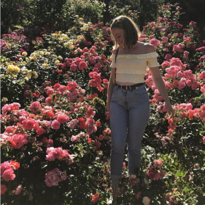 Lily Foucault in a rose garden. 