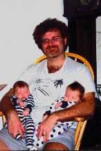Dad and the girls relaxing on the rocker