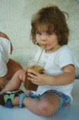 Allison drinking an iced coffee