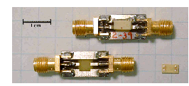 image of small electronic parts, looks like little fuses
