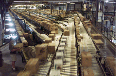 images of many packages moving down a factory belt