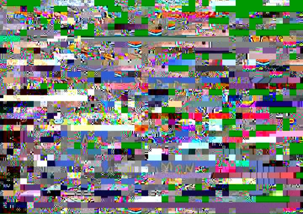 A blocky frame of a digital video showing many green squares