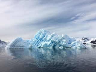 A photograph of a glacier melting.