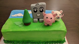 A cake of Gidget the robot.