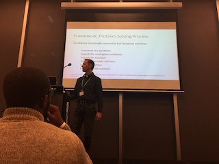 A photograph of Dastyni Loksa giving his talk on self-regulation.