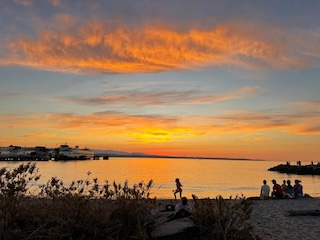 An orange and blue sunset against the Puget Sound.