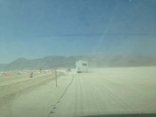 My family driving into dusty Burning Man.