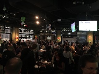 The DUB party in a restaurant at CHI 2017 showing hundreds of attendees.