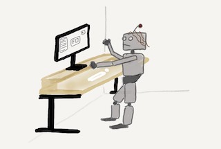 A blocky grey robot stands in front of a desk an inelegantly operates a mouse and keyboard.
