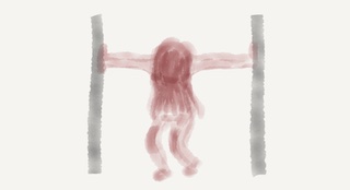 A feminine figure leaning over, head facing down, pushing against two walls grey walls of an enclosure.