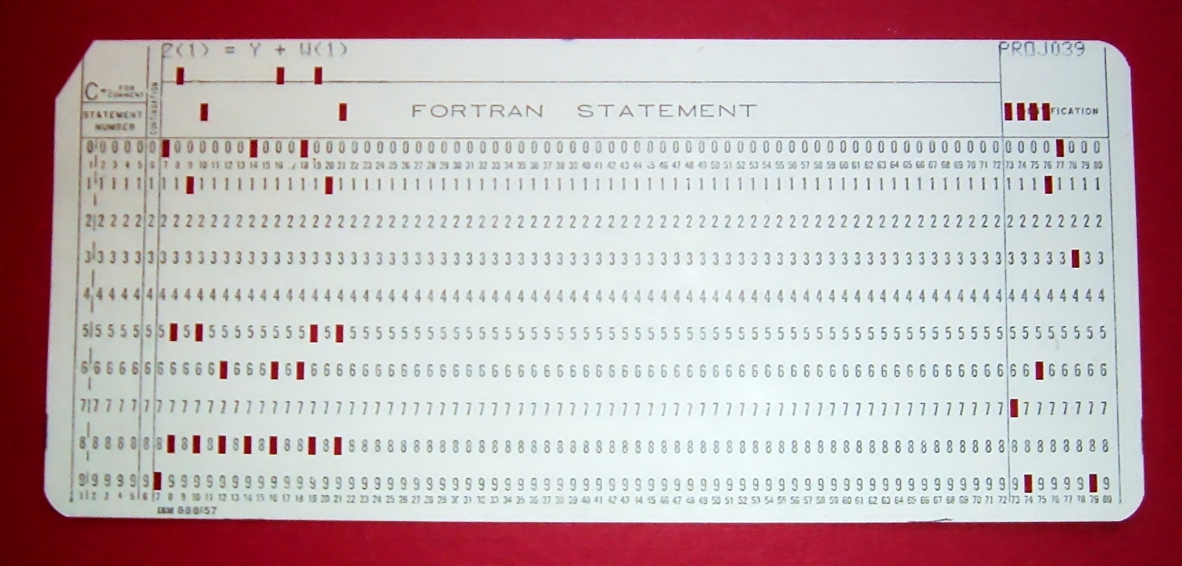 assembly - How binaries are generated using Punched cards